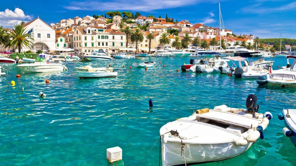 A lot of boats in a blue water