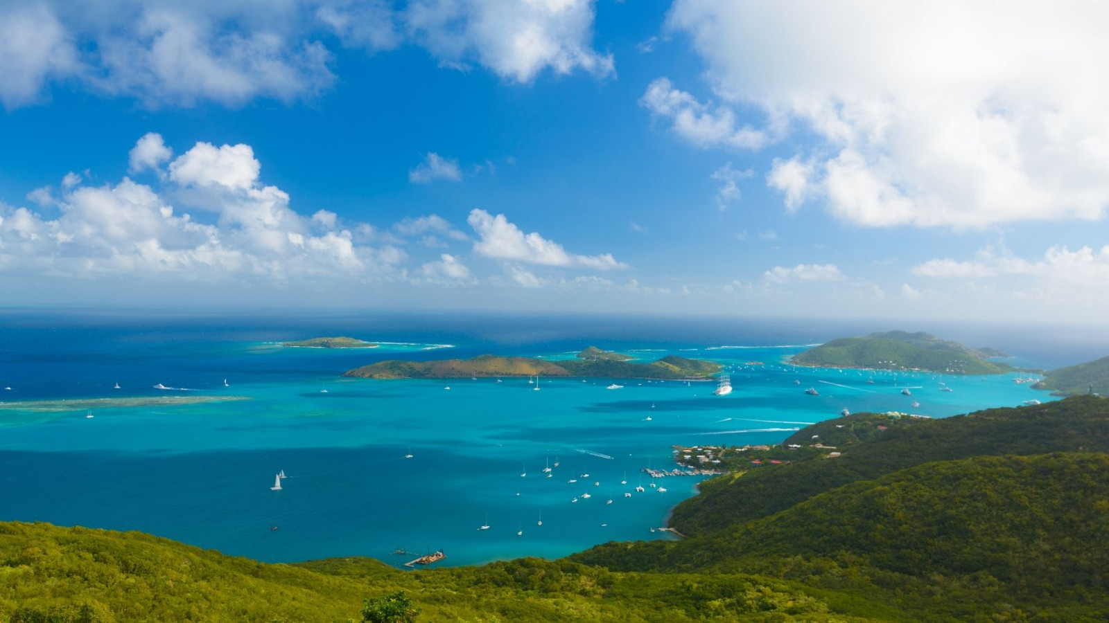 Lush green Islands surrounded by turquoise water.